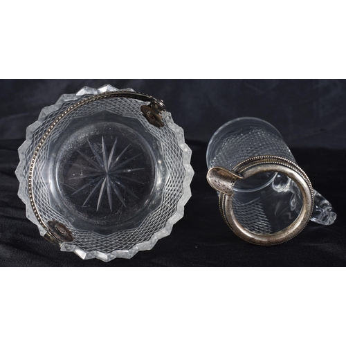 371 - AN ANTIQUE SILVER MOUNTED CUT GLASS BASKET and a matching jug. Largest 9 cm wide. (2)
