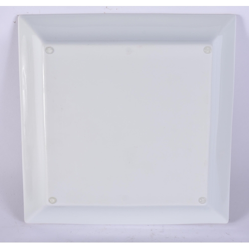 372 - A CARTIER PORCELAIN PLATE. 27 cm wide.