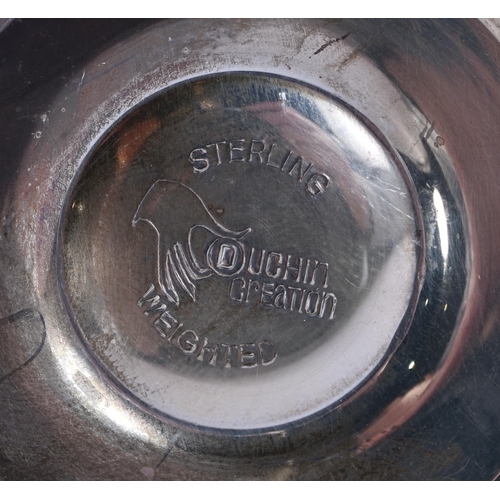 383 - A PAIR OF SILVER CANDLESTICKS. 360 grams overall. 9.5 cm high.