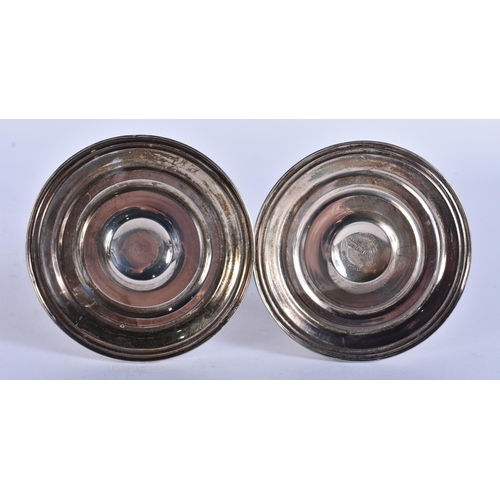 383 - A PAIR OF SILVER CANDLESTICKS. 360 grams overall. 9.5 cm high.