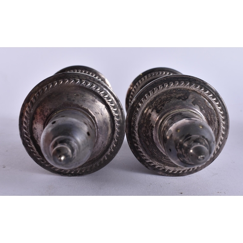 393 - A PAIR OF SILVER PEPPER POTS. 250 grams overall. 11 cm high.