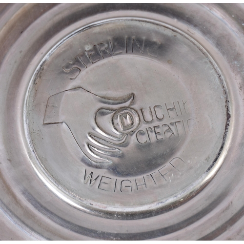 393 - A PAIR OF SILVER PEPPER POTS. 250 grams overall. 11 cm high.