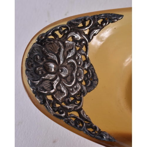 405 - A SET OF 19TH CENTURY INDIAN SILVER MOUNTED HORN BOWLS. Largest 18 cm wide. (7)