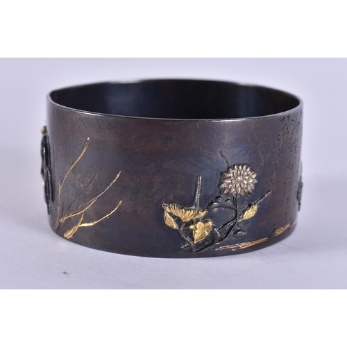 40G - A 19TH CENTURY JAPANESE MEIJI PERIOD ONLAID BRONZE NAPKIN RING decorated with birds and flowers. 5 c... 