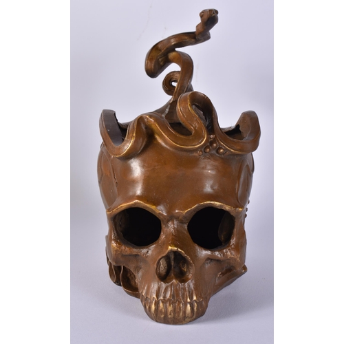 413 - A CONTINENTAL BRONZE SERPENT AND SKULL. 21 cm x 12 cm.