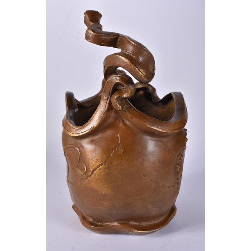 413 - A CONTINENTAL BRONZE SERPENT AND SKULL. 21 cm x 12 cm.