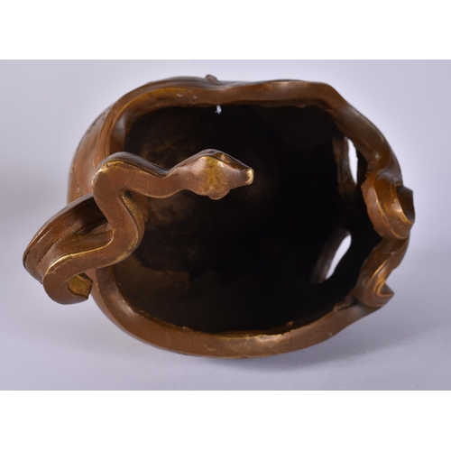 413 - A CONTINENTAL BRONZE SERPENT AND SKULL. 21 cm x 12 cm.