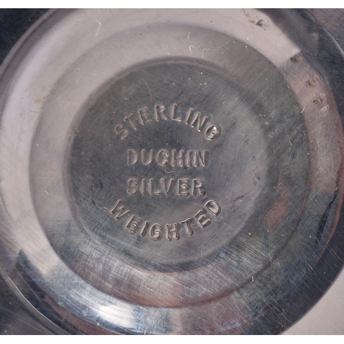 418 - A PAIR OF SILVER CANDLESTICKS. 530 grams overall. 18 cm high.