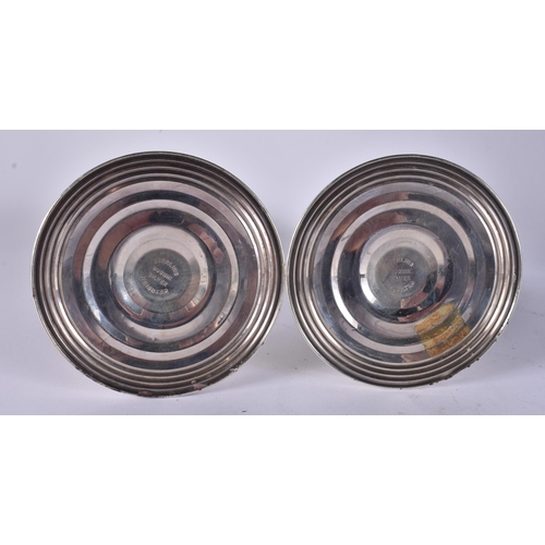 418 - A PAIR OF SILVER CANDLESTICKS. 530 grams overall. 18 cm high.