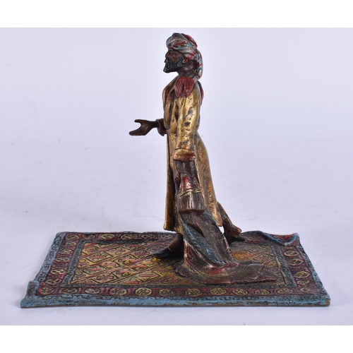 429 - A COLD PAINTED BRONZE ARABIC MALE. 11 cm x 9.5 cm.
