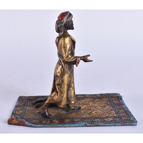 429 - A COLD PAINTED BRONZE ARABIC MALE. 11 cm x 9.5 cm.