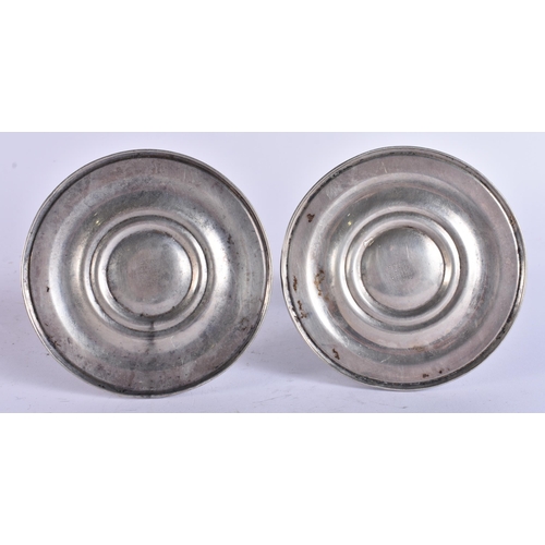 437 - A PAIR OF SILVER CANDLESTICKS. 500 grams overall. 10 cm high.