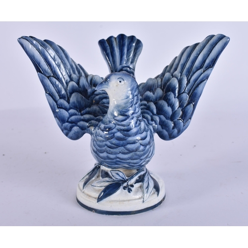 46 - AN EXTREMELY RARE 19TH CENTURY WEDGWOOD BLUE AND WHITE BIRD modelled upon a base smothered in leaves... 