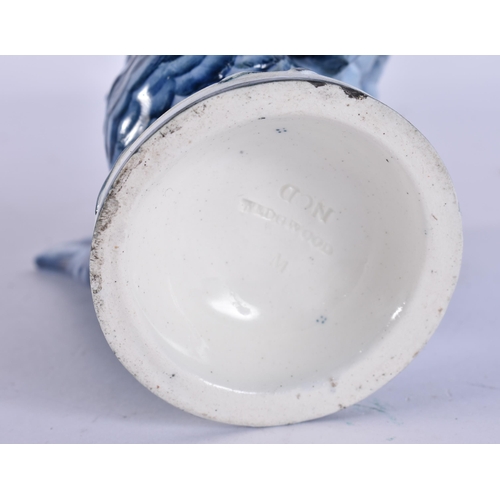 46 - AN EXTREMELY RARE 19TH CENTURY WEDGWOOD BLUE AND WHITE BIRD modelled upon a base smothered in leaves... 