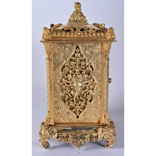 467 - A BRONZE RETICULATED CARRIAGE CLOCK. 19 cm high.