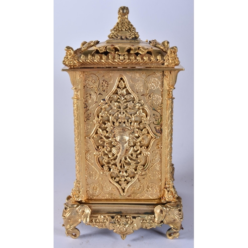 467 - A BRONZE RETICULATED CARRIAGE CLOCK. 19 cm high.