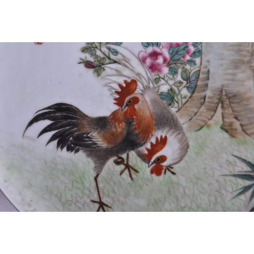 478 - TWO EARLY 20TH CENTURY CHINESE PORCELAIN PLATES Late Qing/Republic. 23.5 cm wide. (2)