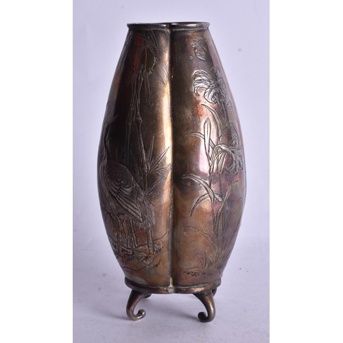 486 - A 19TH CENTURY JAPANESE MEIJI PERIOD WHITE METAL VASE decorated with birds. 18 cm high.