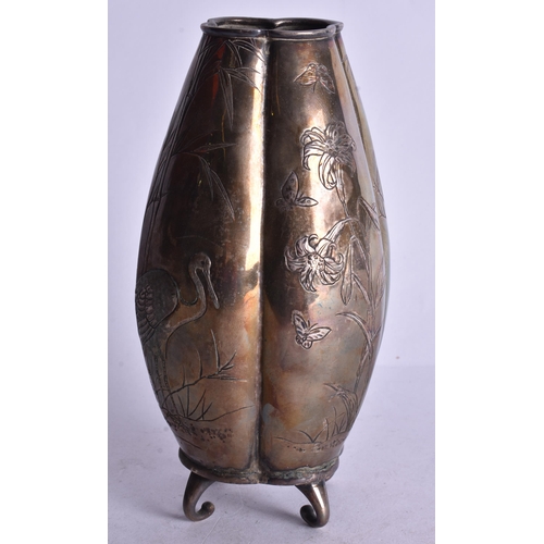 486 - A 19TH CENTURY JAPANESE MEIJI PERIOD WHITE METAL VASE decorated with birds. 18 cm high.