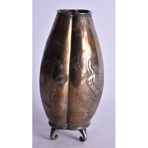 486 - A 19TH CENTURY JAPANESE MEIJI PERIOD WHITE METAL VASE decorated with birds. 18 cm high.