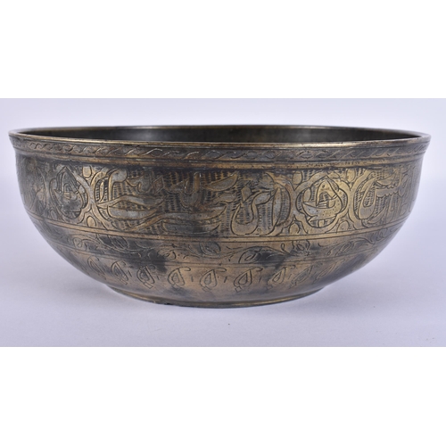 560 - AN 18TH CENTURY MIDDLE EASTERN ISLAMIC TINNED BRONZE BASIN decorated with scripture. 22 cm wide.
