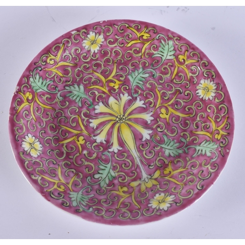 587 - A LATE 19TH CENTURY CHINESE STRAITS PORCELAIN SAUCER together with a jade amulet. Largest 14 cm wide... 