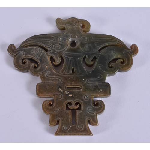 587 - A LATE 19TH CENTURY CHINESE STRAITS PORCELAIN SAUCER together with a jade amulet. Largest 14 cm wide... 