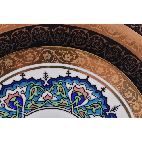 592 - AN UNUSUAL ISLAMIC MARKET CERAMIC PLATE. 25 cm diameter.