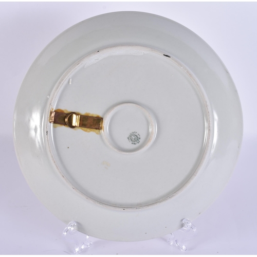 592 - AN UNUSUAL ISLAMIC MARKET CERAMIC PLATE. 25 cm diameter.