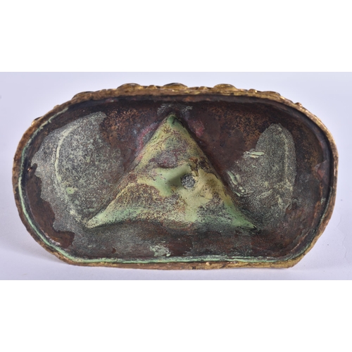 60D - AN 18TH/19TH CENTURY TIBETAN GILT BRONZE FIGURE OF A BUDDHIST DEITY modelled upon a triangular base ... 