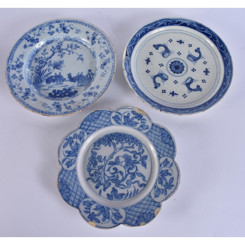 60F - A RARE 18TH CENTURY DELFT BLUE AND WHITE TIN GLAZED DISH together with two others. 21.5 cm wide. (3)