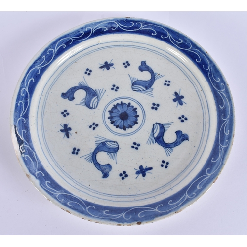 60F - A RARE 18TH CENTURY DELFT BLUE AND WHITE TIN GLAZED DISH together with two others. 21.5 cm wide. (3)