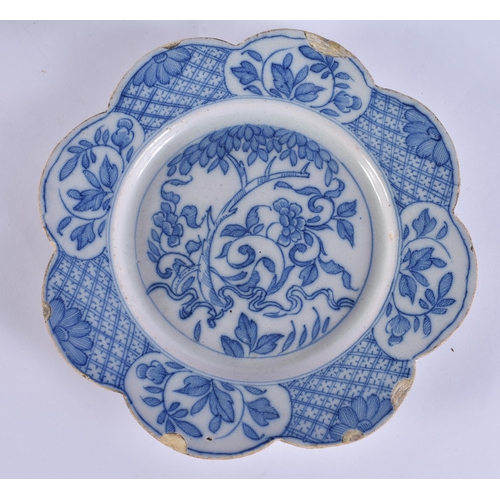60F - A RARE 18TH CENTURY DELFT BLUE AND WHITE TIN GLAZED DISH together with two others. 21.5 cm wide. (3)