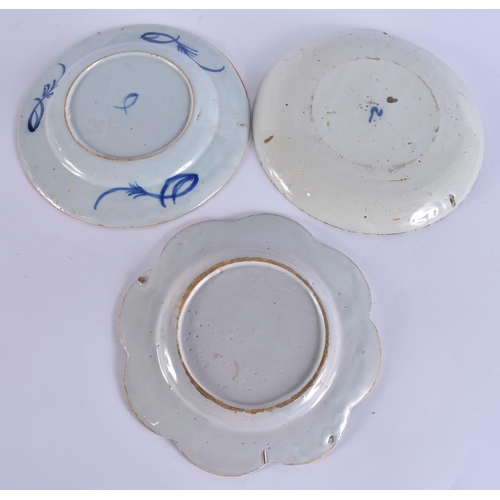 60F - A RARE 18TH CENTURY DELFT BLUE AND WHITE TIN GLAZED DISH together with two others. 21.5 cm wide. (3)