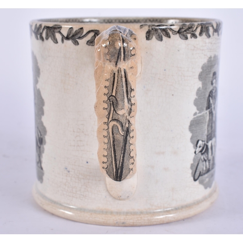 654 - A MID 19TH CENTURY ENGLISH BLACK AND WHITE POTTERY MUG. 15 cm wide.