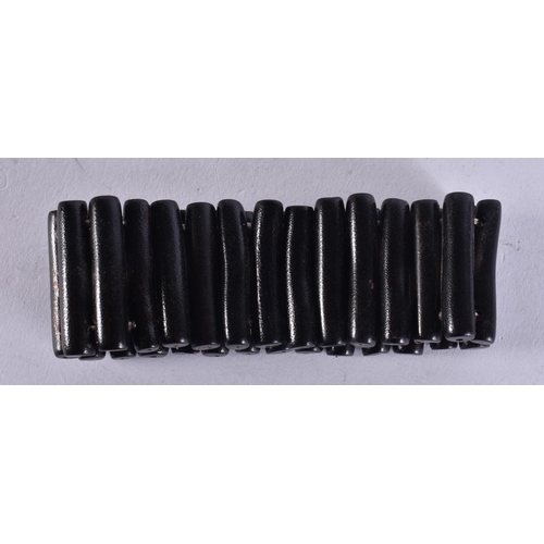 659 - A BLACK CORAL STICK BRACELET. 19 cm long.