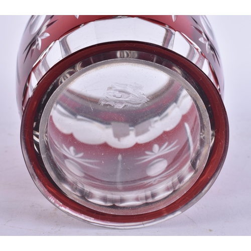 669 - A SILVER MOUNTED RUBY GLASS BARREL. 27 cm high inc handle.