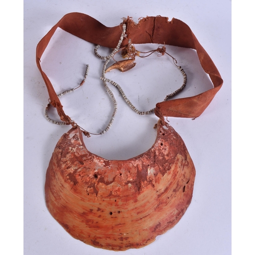 676 - A PAPUA NEW GUINEA TRIBAL SHELL CURRENCY NECKLACE. Shell 24 cm x 18 cm.