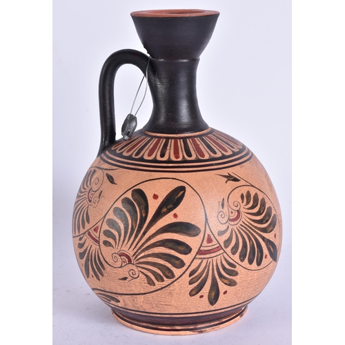 690 - AN ANTIQUITY STYLE POTTERY VASE. 17 cm high.