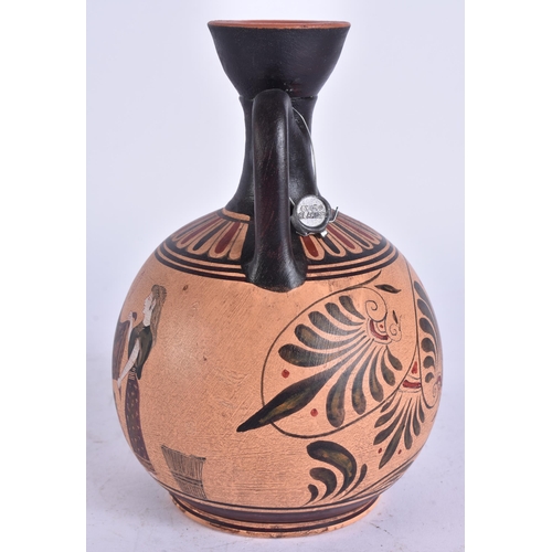 690 - AN ANTIQUITY STYLE POTTERY VASE. 17 cm high.
