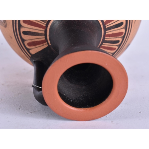 690 - AN ANTIQUITY STYLE POTTERY VASE. 17 cm high.