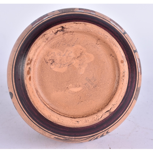 690 - AN ANTIQUITY STYLE POTTERY VASE. 17 cm high.