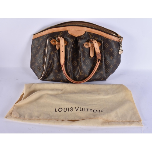 730 - A LOUIS VUITTON LEATHER BAG. 42 cm x 28 cm.
