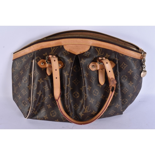 730 - A LOUIS VUITTON LEATHER BAG. 42 cm x 28 cm.