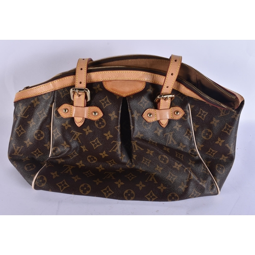 730 - A LOUIS VUITTON LEATHER BAG. 42 cm x 28 cm.