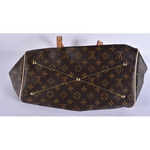 730 - A LOUIS VUITTON LEATHER BAG. 42 cm x 28 cm.
