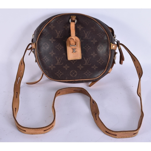 732 - A SMALLER LOUIS VUITTON LEATHER HANDBAG. 24 cm wide.