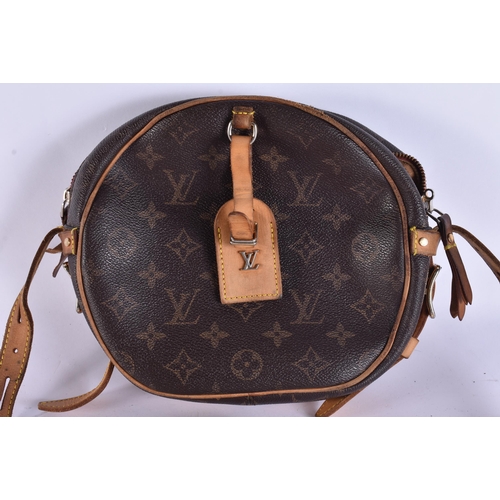 732 - A SMALLER LOUIS VUITTON LEATHER HANDBAG. 24 cm wide.