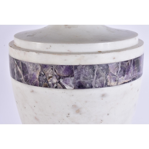 738 - A LARGE CARVED STONE AND AMETHYST ADAMS STYLE URN. 47 cm high.