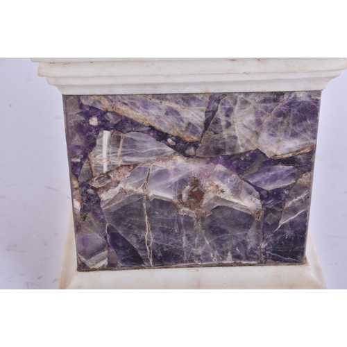 738 - A LARGE CARVED STONE AND AMETHYST ADAMS STYLE URN. 47 cm high.